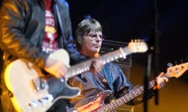 Andy Rourke performs at the Manchester vs Cancer charity concert in Manchester