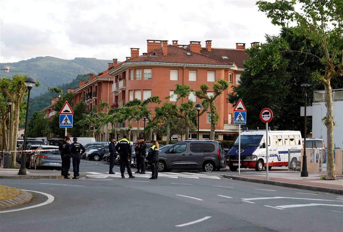 <i>Vincent West/Reuters</i><br/>Police cordon off the area where a man and a woman died in a suspected bomb blast in Orio