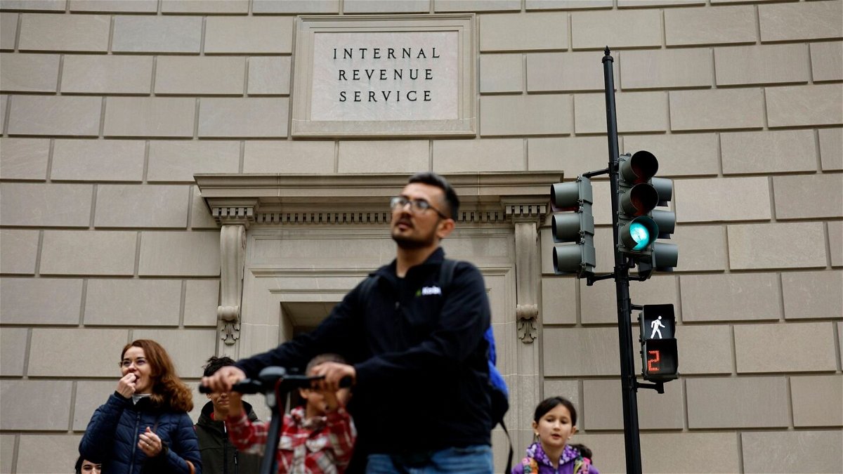 <i>Chip Somodevilla/Getty Images</i><br/>Tourists walk past the headquarters of the Internal Revenue Service near the National Mall on April 7 in Washington