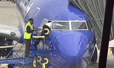A Southwest pilot had to to crawl through an airplane window after a customer accidentally locked the flight deck door