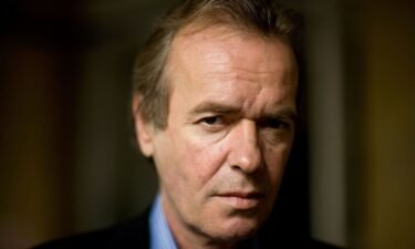 Author Martin Amis poses for a portrait at the Cheltenham Literature Festival held at Cheltenham Town Hall on October 14