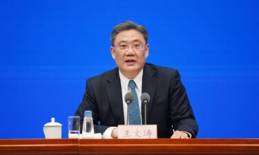 China's Minister of Commerce Wang Wentao attends a news conference in February 2021 in Beijing