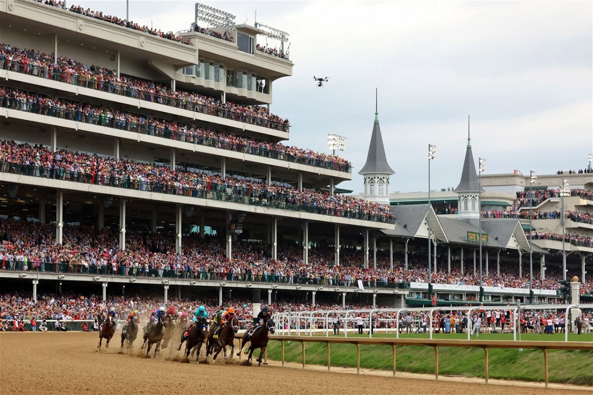<i>Michael Reaves/Getty Images</i><br/>The field heads into the first turn during the 149th running of the Kentucky Derby at Churchill Downs on May 6 in Louisville