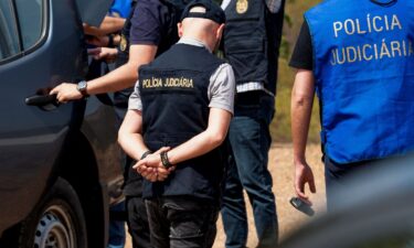 Portugal's investigative Judicial Police are seen at the site of a remote reservoir where a new search for the body of Madeleine McCann is set to take place.