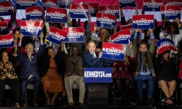 Former Ohio Rep. Dennis Kucinich introduces Robert F. Kennedy Jr. at his official presidential announcement in Boston on April 19. Kennedy has selected Kucinich as his campaign manager.