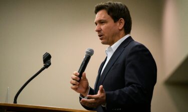 Florida Gov. Ron DeSantis speaks during an Iowa GOP reception on May 13