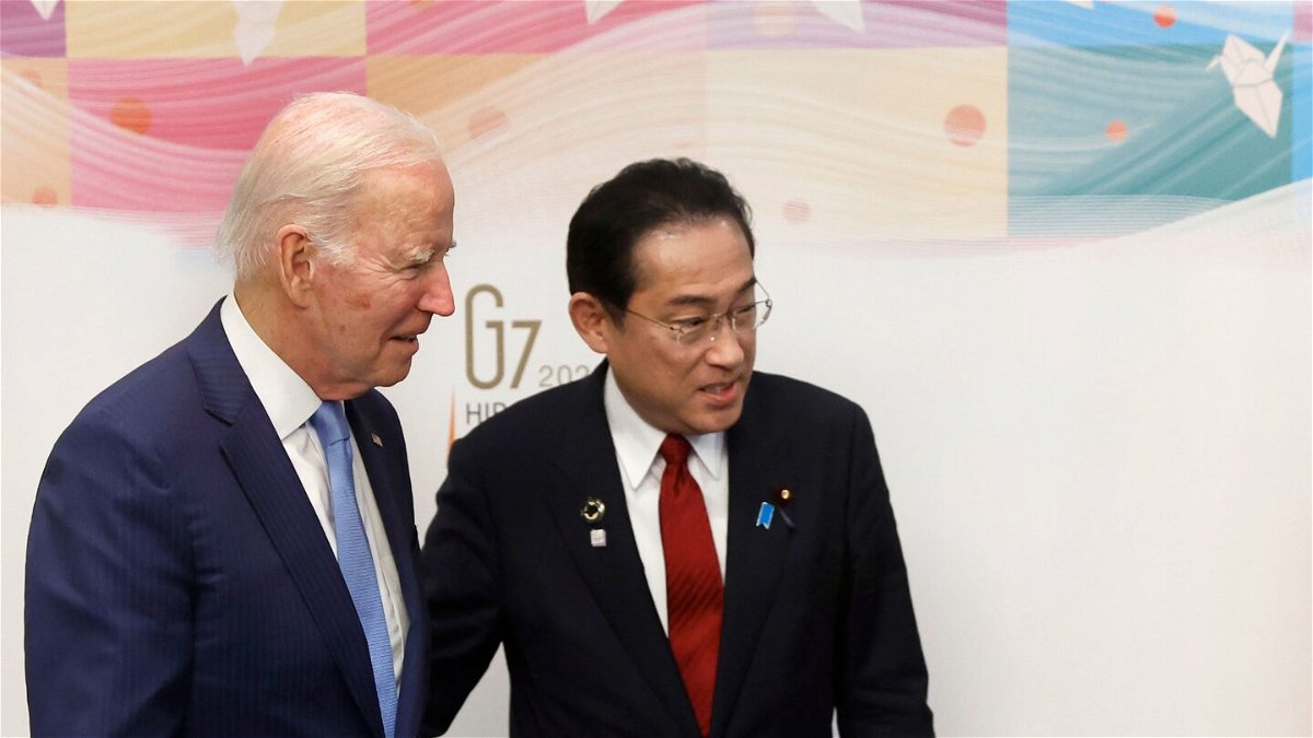 <i>Kiyoshi Ota/AP</i><br/>President Joe Biden shakes hands with Japan's Prime Minister Fumio Kishida prior to a bilateral meeting in Hiroshima
