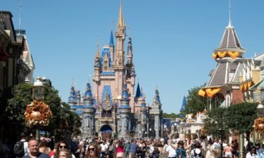 Visitors walk along Main Street at The Magic Kingdom as Walt Disney World in September 2022 in Orlando