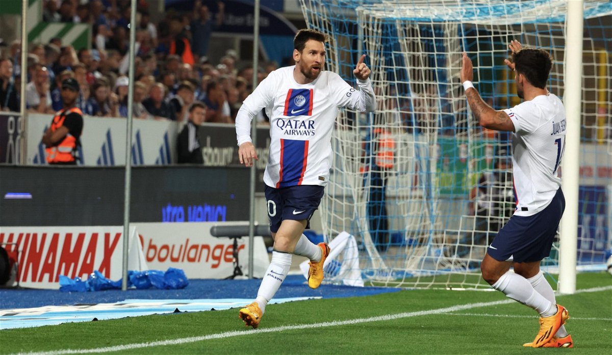 <i>Xavier Laine/Getty Images</i><br/>Lionel Messi celebrates his record-breaking goal.