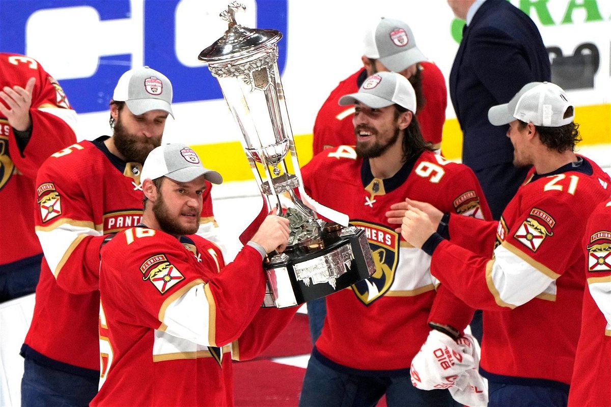 <i>Lynne Sladky/AP</i><br/>Florida Panthers center Aleksander Barkov holds the Prince of Wales trophy after the Panthers won Game 4 of the NHL hockey Stanley Cup Eastern Conference finals against the Carolina Hurricanes in Sunrise