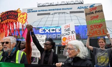 Protesters from the Fossil Free London group demonstrate outside the venue of Shell's annual shareholder meeting in London