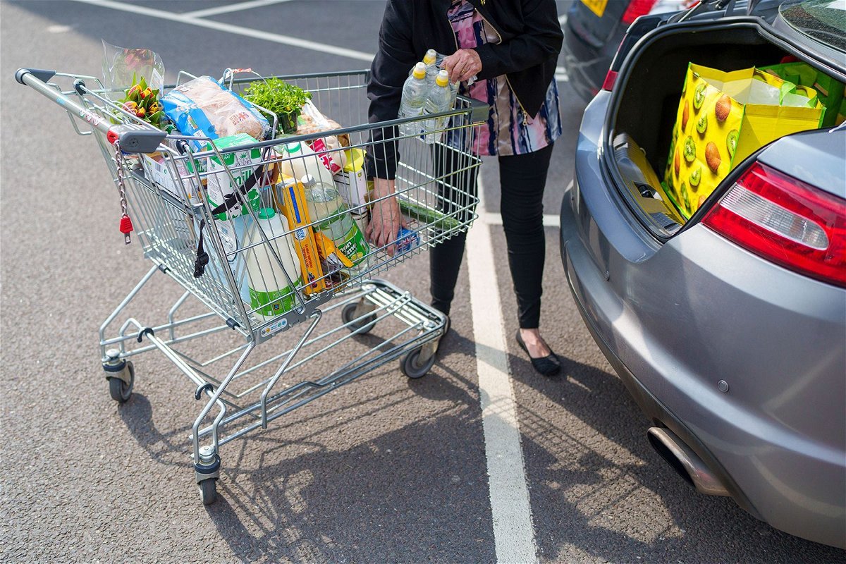 <i>Dominic Lipinski/Bloomberg/Getty Images</i><br/>Britain’s stubbornly high inflation is a major drag on its economy. A shopper loads groceries into a car in Sheffield