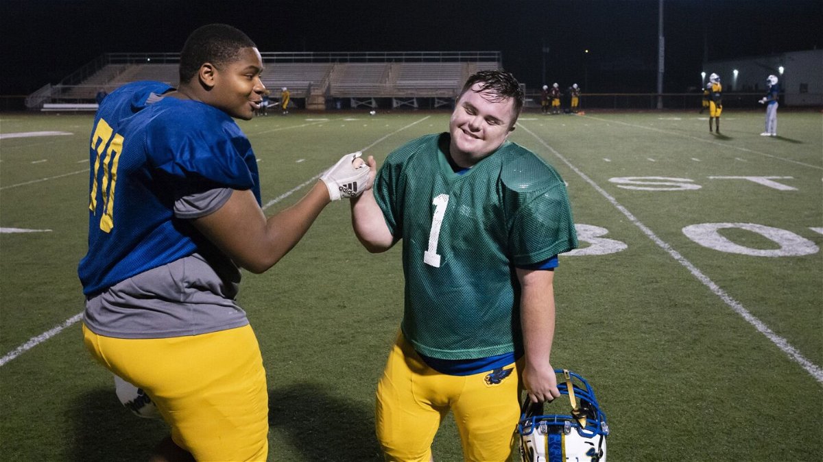 <i>Joshua A. Bickel/The Columbus Dispatch/USA Today Network</i><br/>A teammate jokes with Caden Cox on October 6