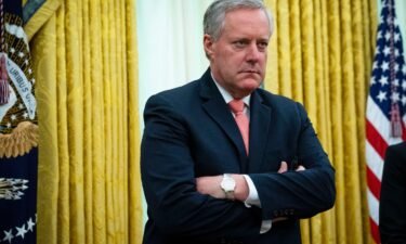 Then White House Chief of Staff Mark Meadows listens as President Donald Trump meets with New Jersey Gov. Phil Murphy in the Oval Office April 30