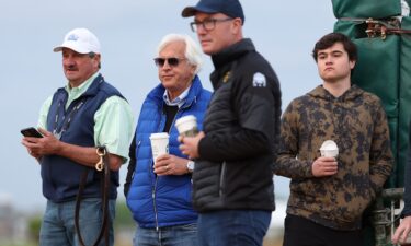 Trainer Bob Baffert watches his horse National Treasure go over the track during a training session ahead of the 148th Preakness Stakes.