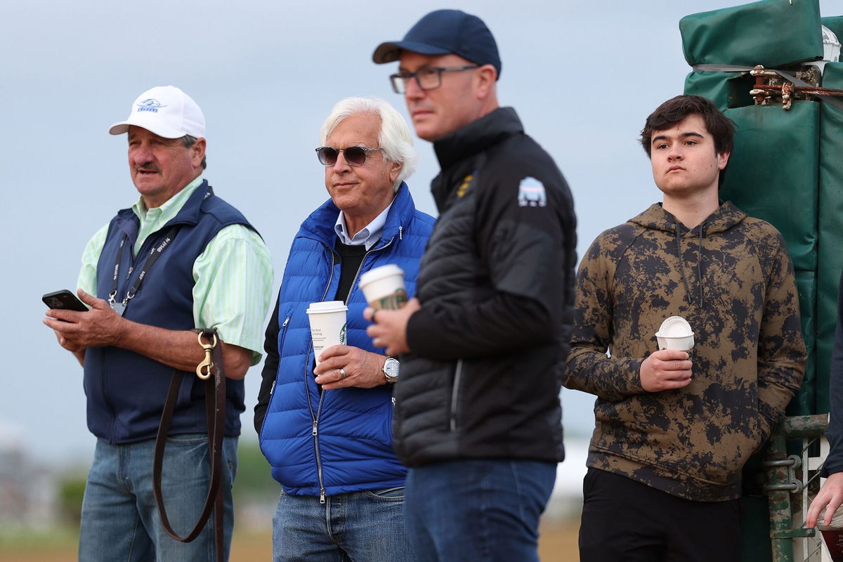 <i>Patrick Smith/Getty Images</i><br/>Trainer Bob Baffert watches his horse National Treasure go over the track during a training session ahead of the 148th Preakness Stakes.