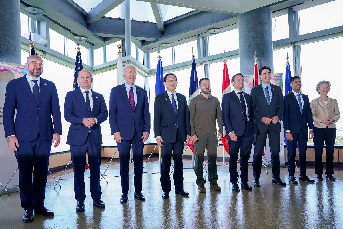 <i>Susan Walsh/Pool/Reuters</i><br/>G7 leaders and Ukrainian President Volodymyr Zelensky pose for a photo before a working session on Ukraine during the G7 Summit in Hiroshima