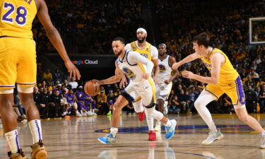 Curry dribbles the ball during Game 5