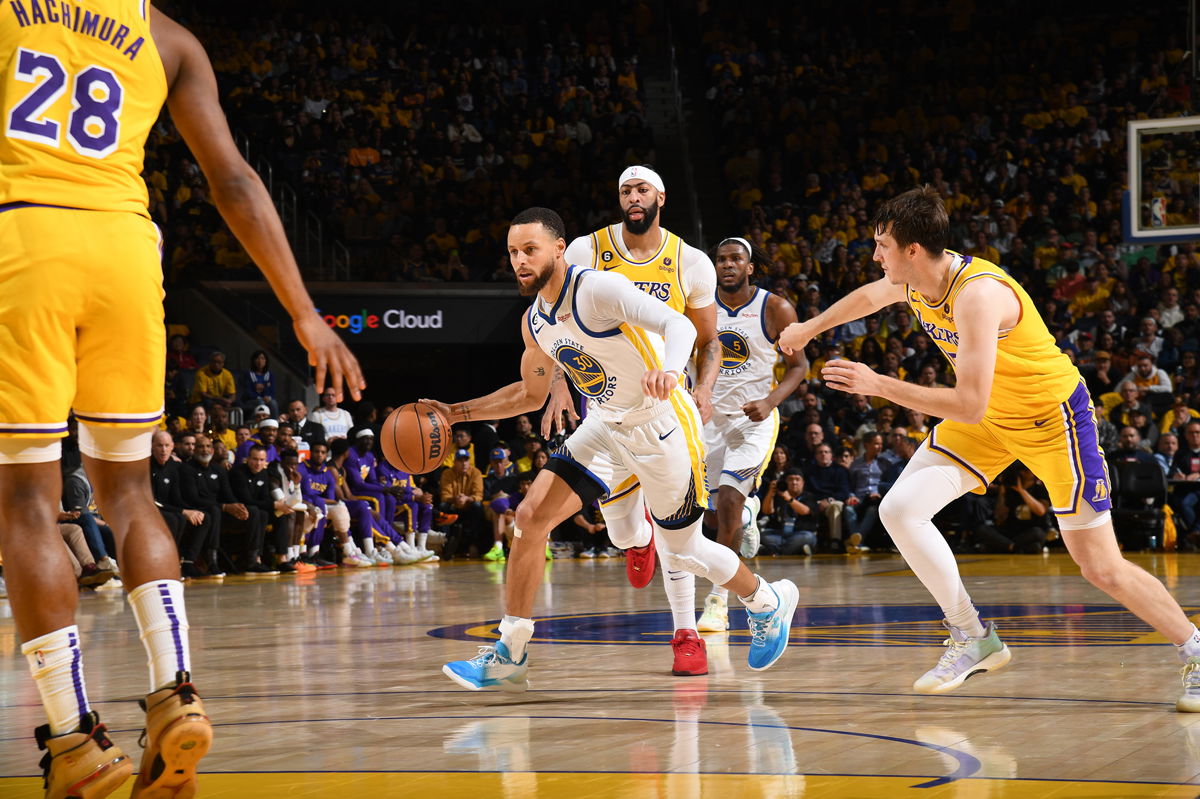 <i>Noah Graham/NBAE/Getty Images</i><br/>Curry dribbles the ball during Game 5