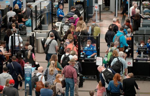 AAA says this Memorial Day weekend could be the busiest at airports since 2005. Pictured are travelers at Denver International Airport in 2022