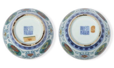 The "Qianlong" seals on the base of the jars.