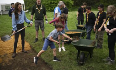 The royals were helping the scouts to reset a path during the massive volunteering event.