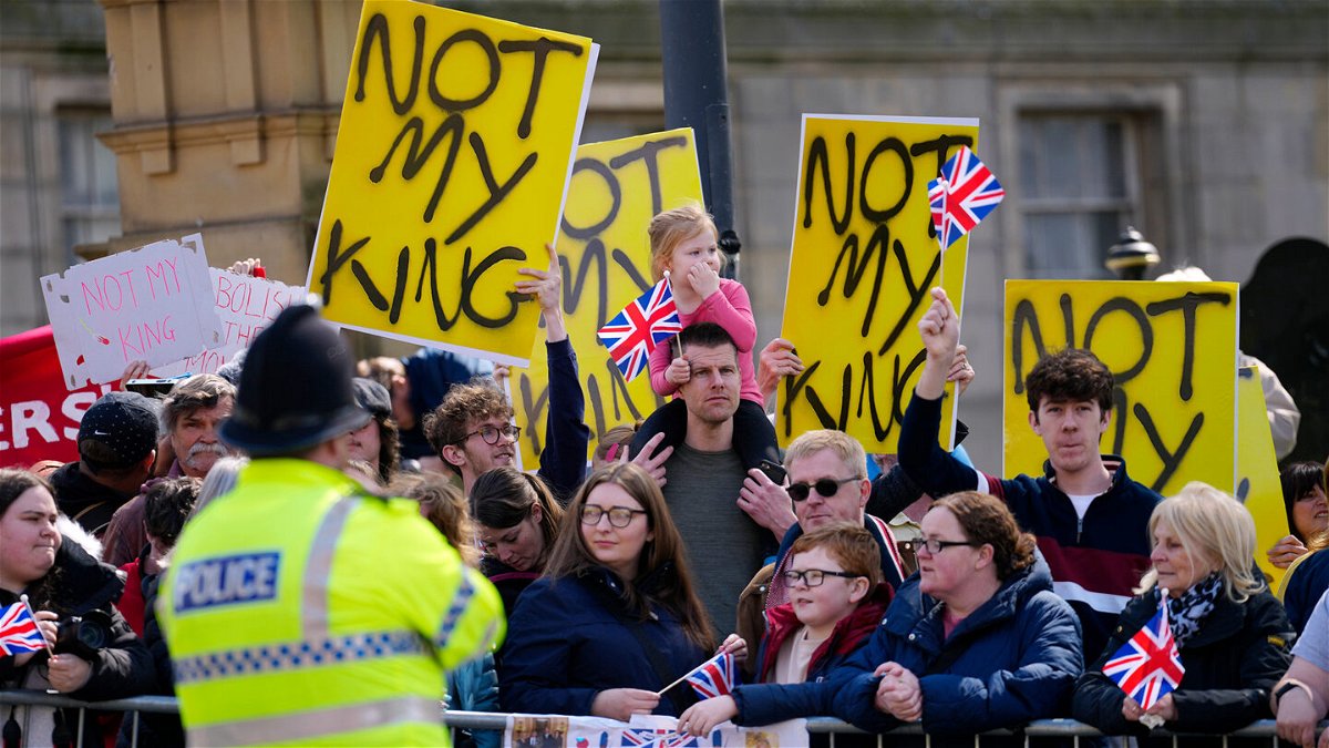<i>Jon Super/WPA/Pool/Getty Images</i><br/>Protestors wait for the arrival of King Charles III and Camilla on April 26 in Liverpool