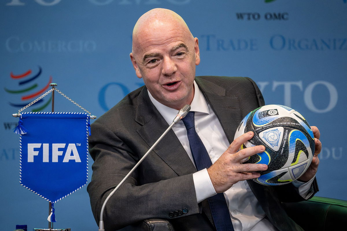 <i>Fabrice Coffrini/AFP/Getty Images</i><br/>FIFA President Gianni Infantino holds an official ball of the 2023 FIFA Women's World Cup on May 1.