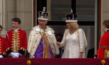 Britain's King Charles III and Queen Camilla appear on the Buckingham Palace balcony with various members of the royal family following their coronation in London on Saturday.