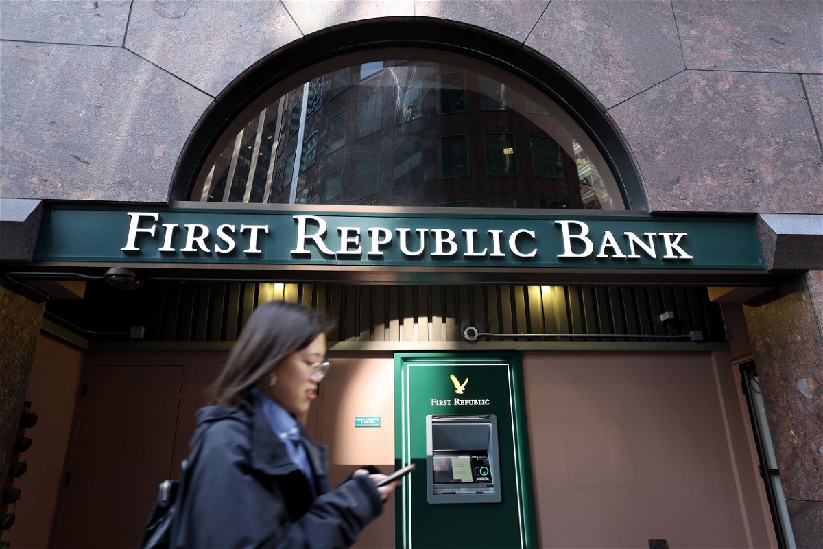 <i>Justin Sullivan/Getty Images</i><br/>A pedestrian walks by a First Republic Bank office on March 16