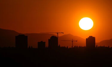 The sun sets over the University District in Seattle