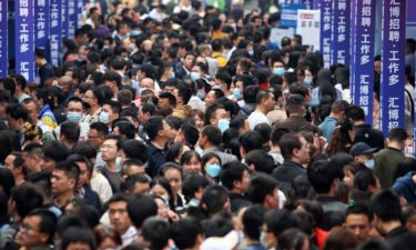 Pictured is a crowded job fair in the southwestern Chinese city of Chongqing on April 11.