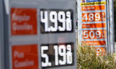 Inflation eased further in April. Gas prices are displayed at a gas station on April 12