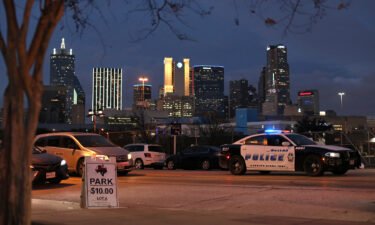 A Dallas Police Department vehicle patrols an area in Dallas