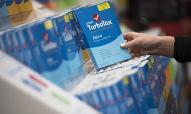 TurboTax  is sending checks to 4.4 million customers as part of a $141 million settlement. The Intuit TurboTax software is on display here.