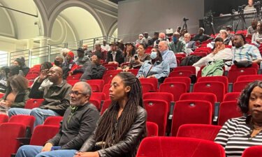People in Oakland listen to the reparations task force