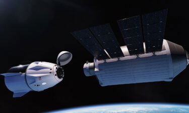 A rendering provided by Vast shows the company's proposed Haven-1 space station (right) docking with a SpaceX Dragon vehicle (left).