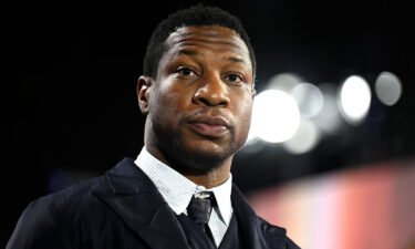 Actor Jonathan Majors appeared in court virtually on May 9 for a hearing related to the assault and harassment charges brought against him in March by the Manhattan District Attorney's Office. Majors is seen here in February.