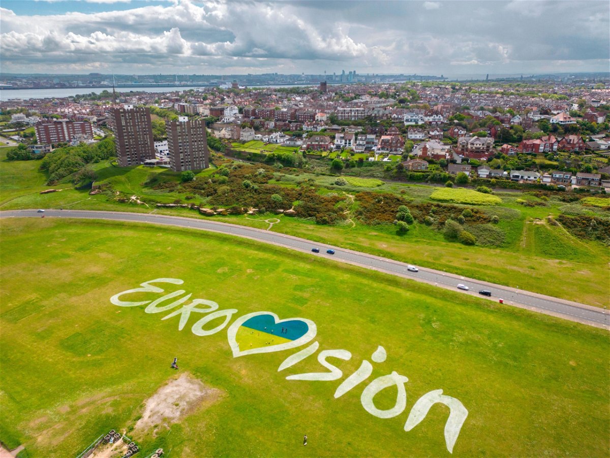 <i>Christopher Furlong/Getty Images</i><br/>An aerial view of a giant mural of the Eurovision 2023 logo incorporating the Ukrainian flag adorns the dips at New Brighton on May 11