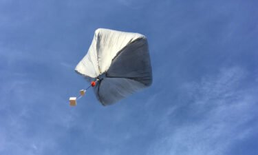 A Sandia National Laboratories solar-powered hot air balloon taking flight bears sensors