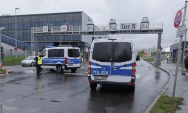 Police vehicles pictured at a Mercedes-Benz plant in Sindelfingen