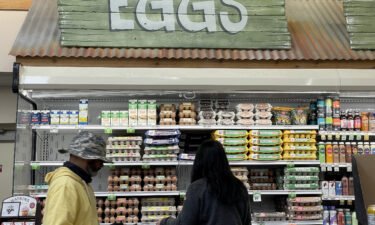 Inflation is cooling. Customers shop for eggs at a Sprouts grocery store on April 12