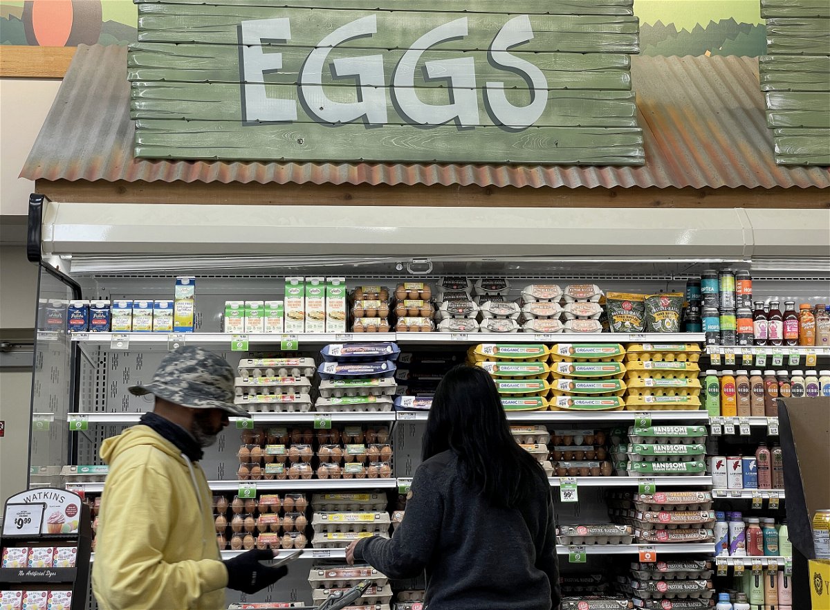 <i>Justin Sullivan/Getty Images</i><br/>Inflation is cooling. Customers shop for eggs at a Sprouts grocery store on April 12