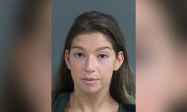 Jamie Komoroski's blood alcohol level was over three times the legal limit when she allegedly drove her car into a golf-cart style vehicle carrying a newly married couple.