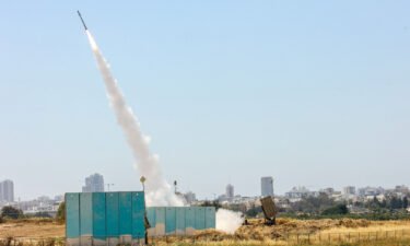 The Israeli military fires a rocket from their Iron Dome defense system towards Gaza on May 10