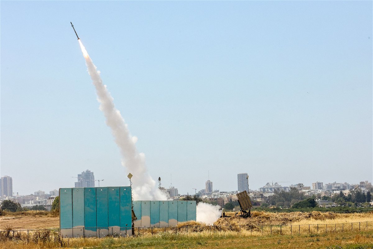 <i>Gil Cohen-Magen/AFP/Getty Images</i><br/>The Israeli military fires a rocket from their Iron Dome defense system towards Gaza on May 10
