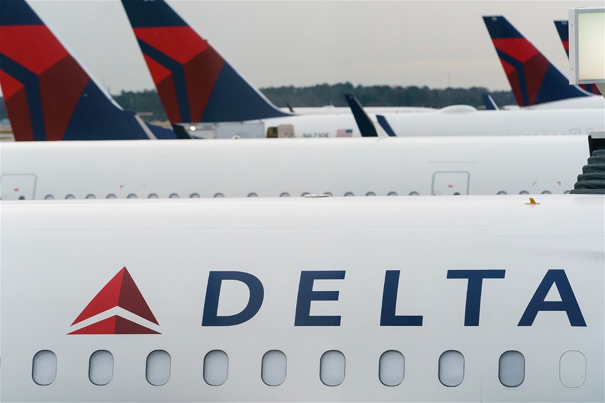 <i>Elijah Nouvelage/Bloomberg/Getty Images</i><br/>A swarm of bees touched down on a parked Delta Air Lines aircraft on May 3