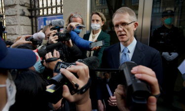 Australian Ambassador to China Graham Fletcher speaks to media outside a court in Beijing