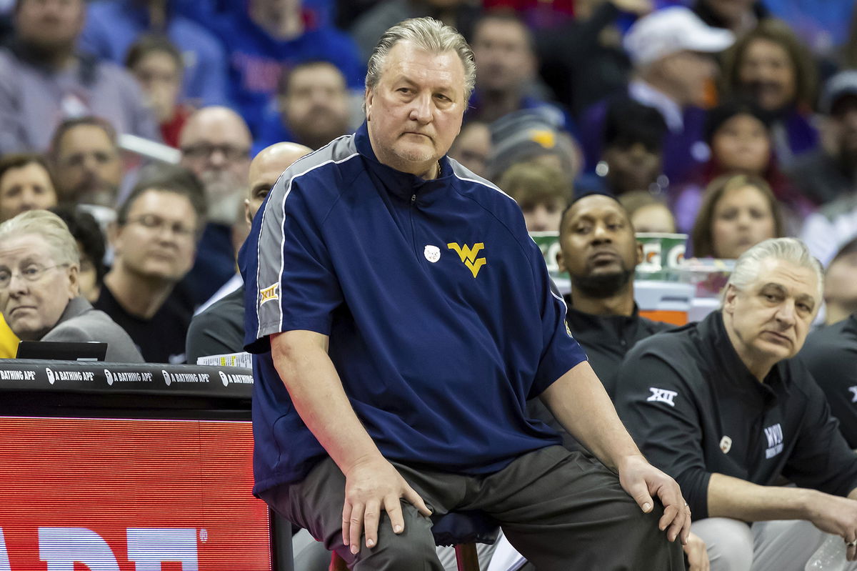 <i>Nick Tre. Smith/Icon Sportswire/AP</i><br/>West Virginia head coach Bob Huggins watches on during a game on March 9.