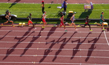 Athletes compete in the men's 1